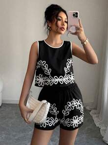 Set de 2 piezas con top sin mangas de estampado gráfico y contraste de color con shorts - Negro - Ver 1