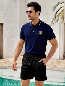 男士纽扣领 Polo 衫，饰有盾形图案，适合在夏威夷享受夏季热带假期。 - 藏蓝色 - 查看 9