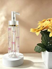 蝴蝶結紋理透明壓式壓克力乳液分裝瓶，100ml、120ml、150ml、200ml多種尺寸可選，瓶身採用透明塑料材質，適用於分裝水性乳液、各種化妝品與化妝水，是旅行與出差理想的便攜容器 - 彩色 - 查看 4