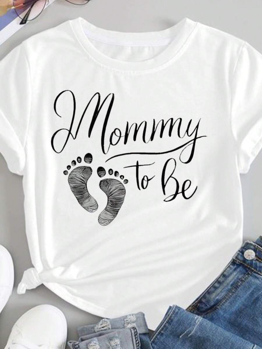Camiseta de Anuncio de Maternidad para Tallas Grandes - Camiseta de Manga Corta con Cuello Redondo para Mujer con Diseño 'Futura Mamá' y Huellas - Ideal para Ropa Casual de Primavera y Veran - negro - Ver 1