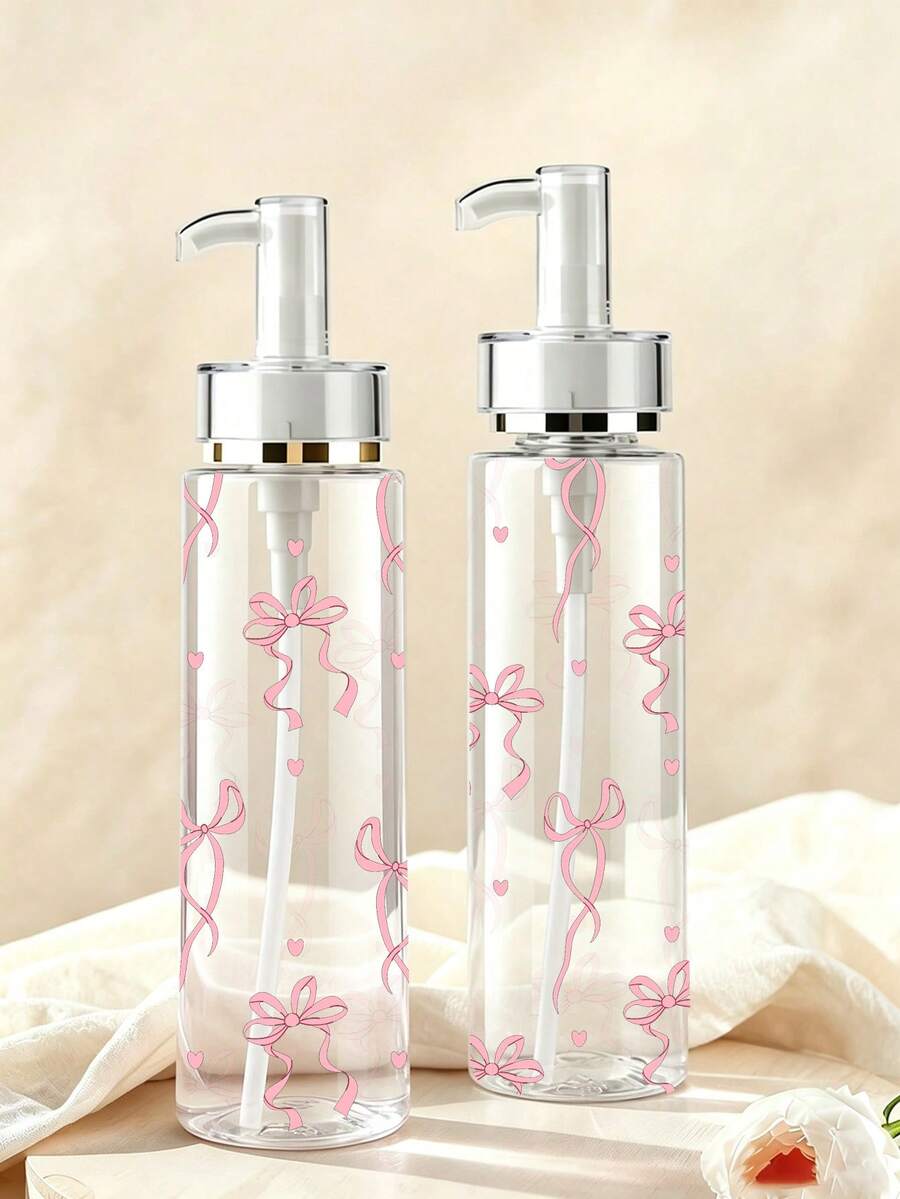 蝴蝶結紋理透明壓式壓克力乳液分裝瓶，提供100ml、120ml、150ml、200ml多種尺寸。瓶身由透明塑料材質製成，適用於分裝水性乳液、各種化妝品和化妝水，是旅行和出差的理想便攜容器。 - 彩色 - 查看 1