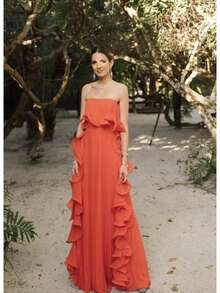 Vestido largo de fiesta naranja sin tirantes, corte en A, con volantes y bajo asimétrico, perfecto para eventos formales y damas de honor. - Naranja - Ver 1