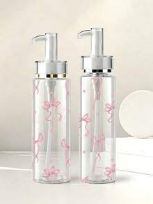 蝴蝶結紋理透明壓式壓克力乳液分裝瓶，提供100ml、120ml、150ml、200ml多種尺寸。瓶身由透明塑料材質製成，適用於分裝水性乳液、各種化妝品和化妝水，是旅行和出差的理想便攜容器。 - 彩色 - 查看 5