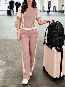 Bộ 2 món nữ phong cách casual xuân/hè, áo thun cổ tròn tay ngắn phối màu block và quần ống đứng suông cạp cao, set áo thun và quần phối màu, trang phục đi nghỉ dưỡng, đồ du lịch, phong cách đi biển, thời trang resort tối giản - Hồng + Mơ - Xem 1