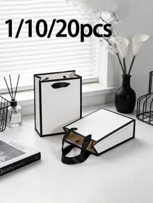 1/10/20入 白色紙袋 黑色邊緣附提把 尺寸12x5.7x16cm 優雅簡約INS風個性化包裝袋 適用於配件、生日禮物、婚禮伴手禮、零售、企業活動迷你紙袋 - 多色 - 查看 1