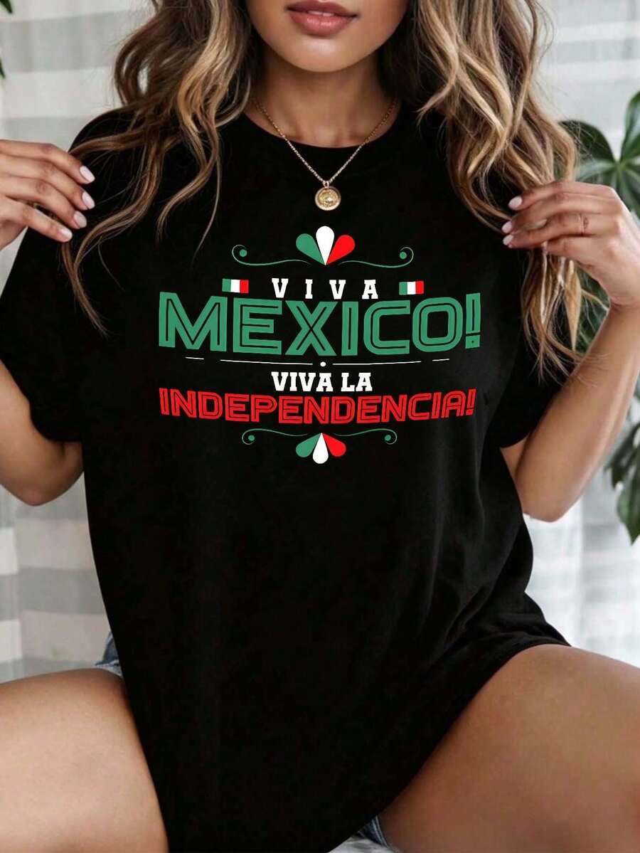 Playera negra para mujer de cuello redondo, manga corta, estampado "Viva México! Viva la Independencia!" con colores de la bandera mexicana, temática patriota para fiestas de independencia, - Negro - Ver 1