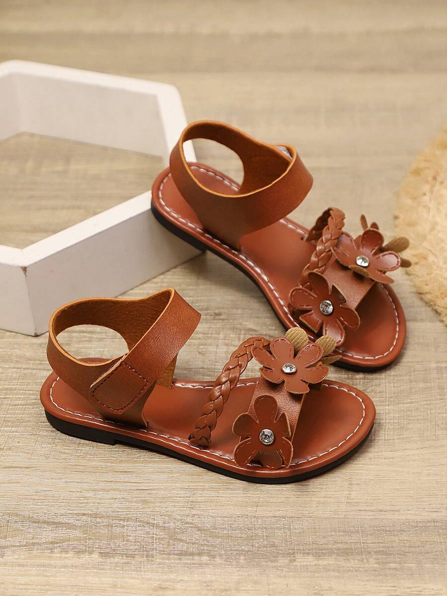 1 Pair Beige Girls' Flat Sandals, Solid Color Soft PU Braided Fabric + Shiny Rhinestone Flower Strap Decor, Classic Single Strap Hook & Loop Design, Round Toe Open Toe Fashionable Cute Beach Sandals, Suitable For 3-12 Years Old Girls' Daily Casual Wear, Spring/Summer New - Brown - View 1