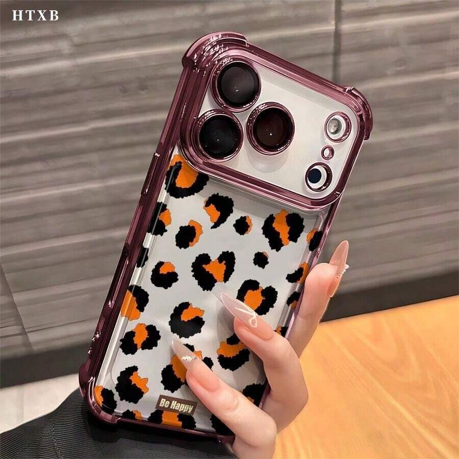 Estampado de leopardo naranja y negro sobre blanco.Compatible con iPhone 17/Air/16/15/14/13/12 Pro/12/11 Plus Max.Esta elegante funda para teléfono con esquinas reforzadas y electrochapadas presenta un diseño moderno.Disponible en una variedad de colores, esta funda híbrida clásica y a prueba de golpes es un regalo perfecto para amigos y familiares en Halloween, Navidad y Día de Acción de Gracias.