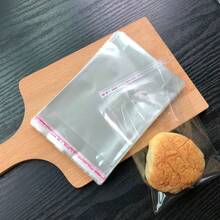 100 piezas Bolsas transparentes autosellantes para galletas, bolsas de plástico transparentes reutilizables y sellables de tamaño pequeño, mediano y grande, bolsas esenciales para hornear y almacenamiento de alimentos, bolsas organizadoras de alimentos multiusos, adecuadas para estantes de pasteles, cajas de pasteles, cajas de pasteles, estantes de tazas de pasteles, cajas de cupcakes - transparente - Ver 2
