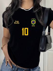 Símbolo deportivo con número dorado que representa pasión por el fútbol y orgullo nacional con escudo verde y azul de Brasil lleno de energía positiva y estilo moderno camiseta de mujer casu - Negro - Ver 1