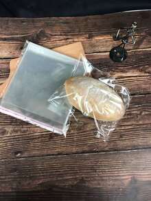 100 piezas Bolsas transparentes autosellantes para galletas, bolsas de plástico transparentes reutilizables y sellables de tamaño pequeño, mediano y grande, bolsas esenciales para hornear y almacenamiento de alimentos, bolsas organizadoras de alimentos multiusos, adecuadas para estantes de pasteles, cajas de pasteles, cajas de pasteles, estantes de tazas de pasteles, cajas de cupcakes - transparente - Ver 4