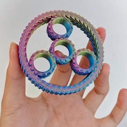 2026-1pc 3D Printed Gear , Gradient Color Multi-Ring Dynamic Ornament. Made Of Durable Polylactic Acid Material, Built-In Rotatable Gears, It's A Fun Stress-Relieving Small Object. This Tactile Stress-Relief Toy Can Relieve Anxiety, Compact And Portable, Placing It On The Desk Helps Improve Concentration. It Belongs To Reusable 3D Printed Gear Ornaments, Suitable For Office, Home And Outdoor Scenes.