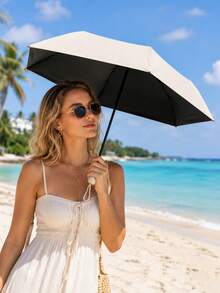 Paraguas de sol compacto tipo cápsula UPF 50+ para mujeres, paraguas de viaje plegable mini con estuche de almacenamiento a juego & gancho de paraguas gratis, paraguas de protección UV con recubrimiento negro para bolso, playa & exterior de verano - Multicolor - Ver 2