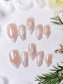 10 Peças de Unhas Postiças Feitas à Mão em Formato de Amêndoa com Estilo Francês Branco, Pó Aurora e Entalhes de Pérola. Versátil para Todos os Formatos de Mão, Perfeito para Passeios Diários, Encontros Doces e Mais Ocasiões. Uma Escolha de Presente Requintada e Luxuosa para Mulheres. Unhas Postiças Feitas à Mão - Branco - Visão 3