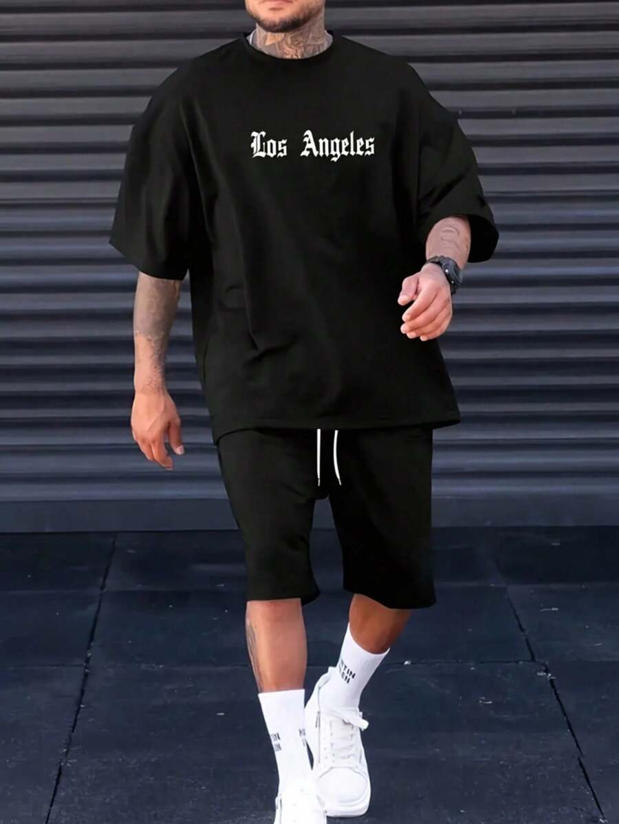 Camiseta de manga corta para hombre, de algodón estampado, ligera y cómoda para uso diario informal. No es un conjunto, los pantalones son solo para referencia de combinación. - Negro - Ver 1
