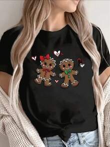 Lightweight Short-Sleeved T-Shirt With An Adorable Gingerbread Couple Design, Ideal For Festive Gatherings And Everyday Wear, Suitable For Home Or Eating Out. - Black - View 1