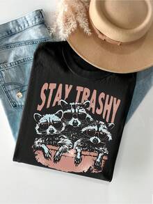 hombres y mujeresCamiseta de mujer HJIYINFAN 100% algodón con estampado "tay Trashy" - diseño de mapache y gafas elegantes, top casual de manga corta y cuello redondo, lavable a máquina, cor - Negro - Ver 1