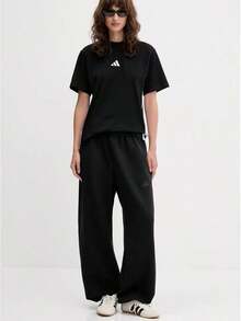 Adidas ESSENTIALS Women's Short-Sleeve Side Stripe Moisture-Wicking Crew Neck Regular T-Shirt In Black - Black - View 3