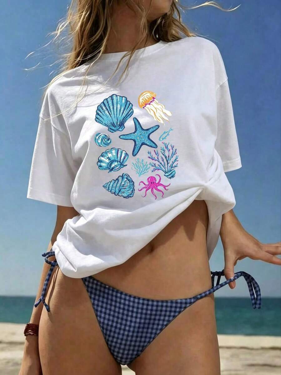Playera Oversize Mujer "Vida Marina Caracolas y Estrellas" - Blanca con Estampado Tropical de Océano LGET - Blanco - Ver 1