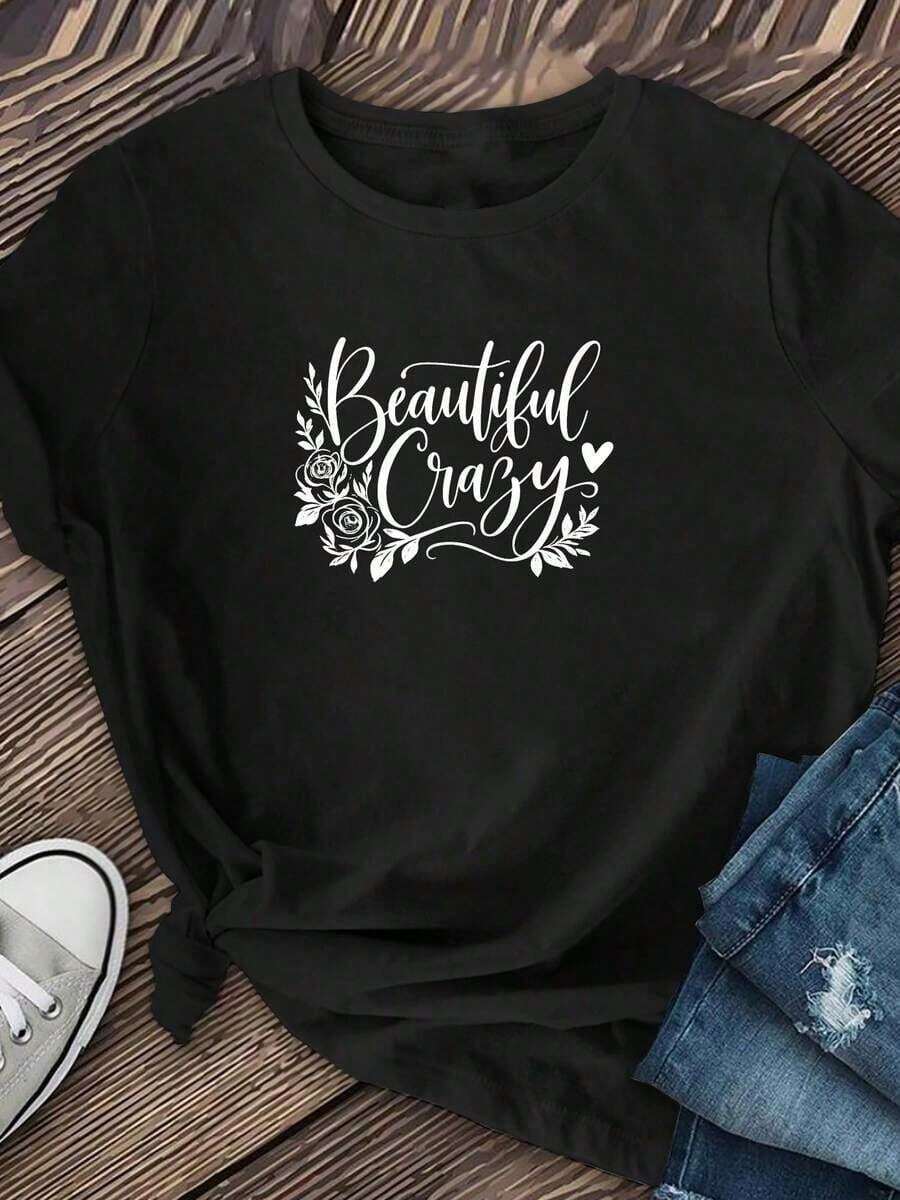 LooseCamiseta de manga corta para mujer con estampado de letras "Hermosa y salvaje"| Fibra casual de moda, elasticidad media, lavable a máquina, cuello redondo, corte regular, adecuada p - Negro - Ver 1