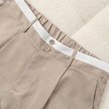Yunuo Menswear  Petite Pantalones rectos casuales de talla grande para mujer con bolsillos contrastantes - Naranja - Ver 7