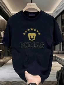 UNAM Pumas, Camiseta Unisex de Manga Corta para Fans de Fútbol Mexicano Papa Pumas, Ropa para Todas las Estaciones, Negra, 90%, Tallas S - XXL Camiseta Casual de Cuello Redondo para Hombre, - Negro - Ver 1