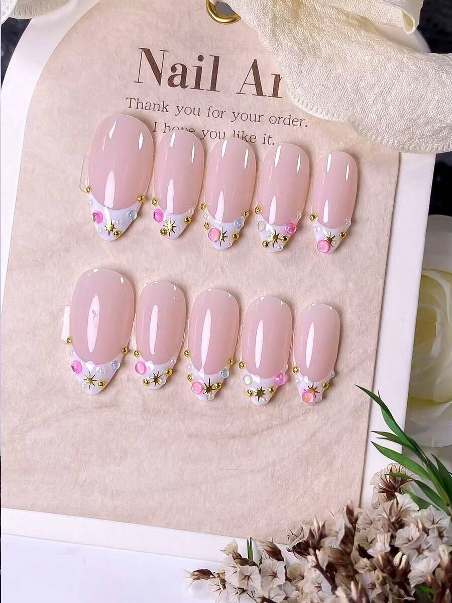 10 Handmade Almond-Shaped Press-On Nails. Crafted With A Nude Base, They Feature Hand-Painted White French Tips, Starbursts And Colorful Rhinestones. Suitable For Daily Wear, Concerts And Light Business Occasions. - Multicolor - View 1