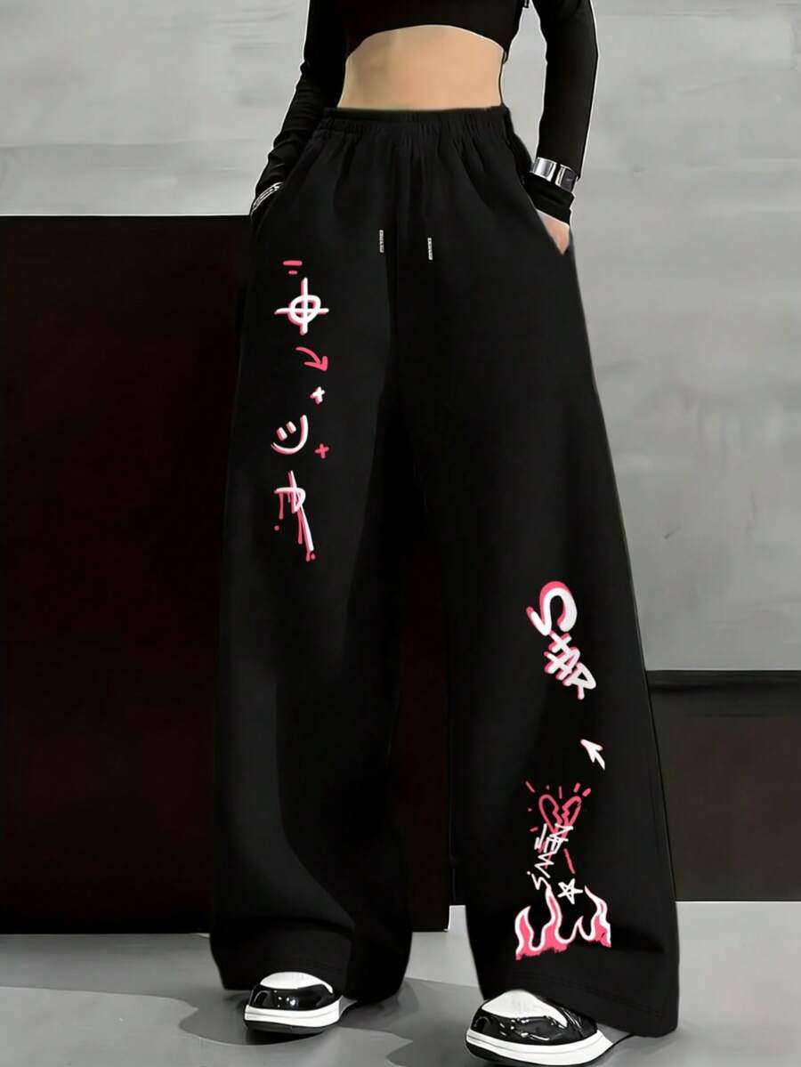 UPTAN Pantalones de pierna recta estilo urbano punk Y2K para mujer con cara sonriente de grafiti y letras - Pantalones holgados al frente, lavables a máquina - Negro - Ver 1