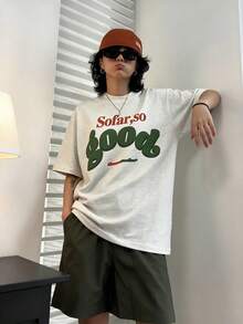 A Casual Women's Knit Short-Sleeved T-Shirt. With A Round Neck, Dropped Shoulders, And Comfortable Regular Length, This Streetwear Top Is Perfect For Everyday Wear. - Light Gray - View 2