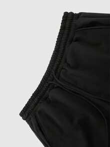 UPTAN Pantalones de pierna recta estilo urbano punk Y2K para mujer con cara sonriente de grafiti y letras - Pantalones holgados al frente, lavables a máquina - Negro - Ver 5