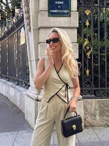 Set de 2 piese pentru femei, vestă fără mâneci cu închidere în cruce și talie legată cu fund, cu bordură contrastantă în stil francez, și pantaloni cu talie înaltă și croială largă, pentru toate anotimpurile, potrivit pentru naveta zilnică la muncă, shopping pe străzile europene, întâlniri la ceai de după-amiază, adunări, excursii scurte la plajă și shopping în mall-uri de lux - Caisă - Vizualizare 6