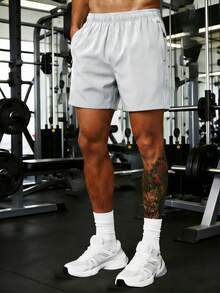 Pantalones cortos deportivos casuales holgados de alto rendimiento para hombre, de secado rápido, unicolor, con diseño de franja reflectante, bolsillos, cremallera y cordón de cintura - Blanco - Ver 3