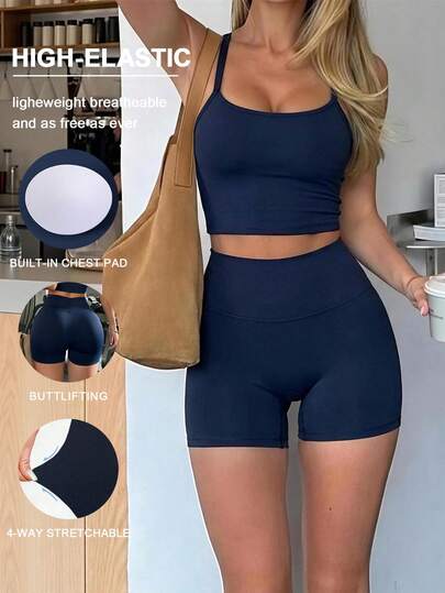 Bộ đồ thể thao nữ mùa hè Aoqta Sports màu trơn, gồm áo hai dây thể thao có đệm lưng chéo ôm sát và quần short bó sát cạp cao giúp kiểm soát vòng bụng, phù hợp cho yoga, chạy bộ, tập luyện và mặc hàng ngày.