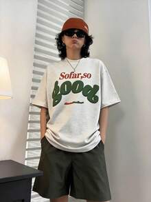 A Casual Women's Knit Short-Sleeved T-Shirt. With A Round Neck, Dropped Shoulders, And Comfortable Regular Length, This Streetwear Top Is Perfect For Everyday Wear. - Light Gray - View 1
