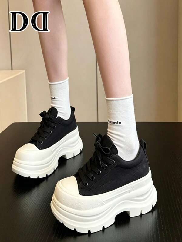 1 par de zapatillas deportivas casuales para mujer estilo europeo y americano, bloque de color negro y blanco, suela gruesa de lona con plataforma, diseño de suela gruesa que aumenta la altura, adecuado para uso diario / casual / escenas de calle
