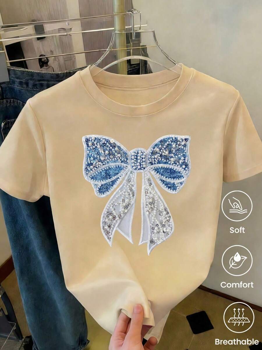 Camiseta de manga corta de moda para primavera y verano de 2026, hecha en México, 180 gramos. Estampado de dibujos animados, modelo de pareja, apta para uso interior o exterior. Cuello redon - Estilo - Ver 1