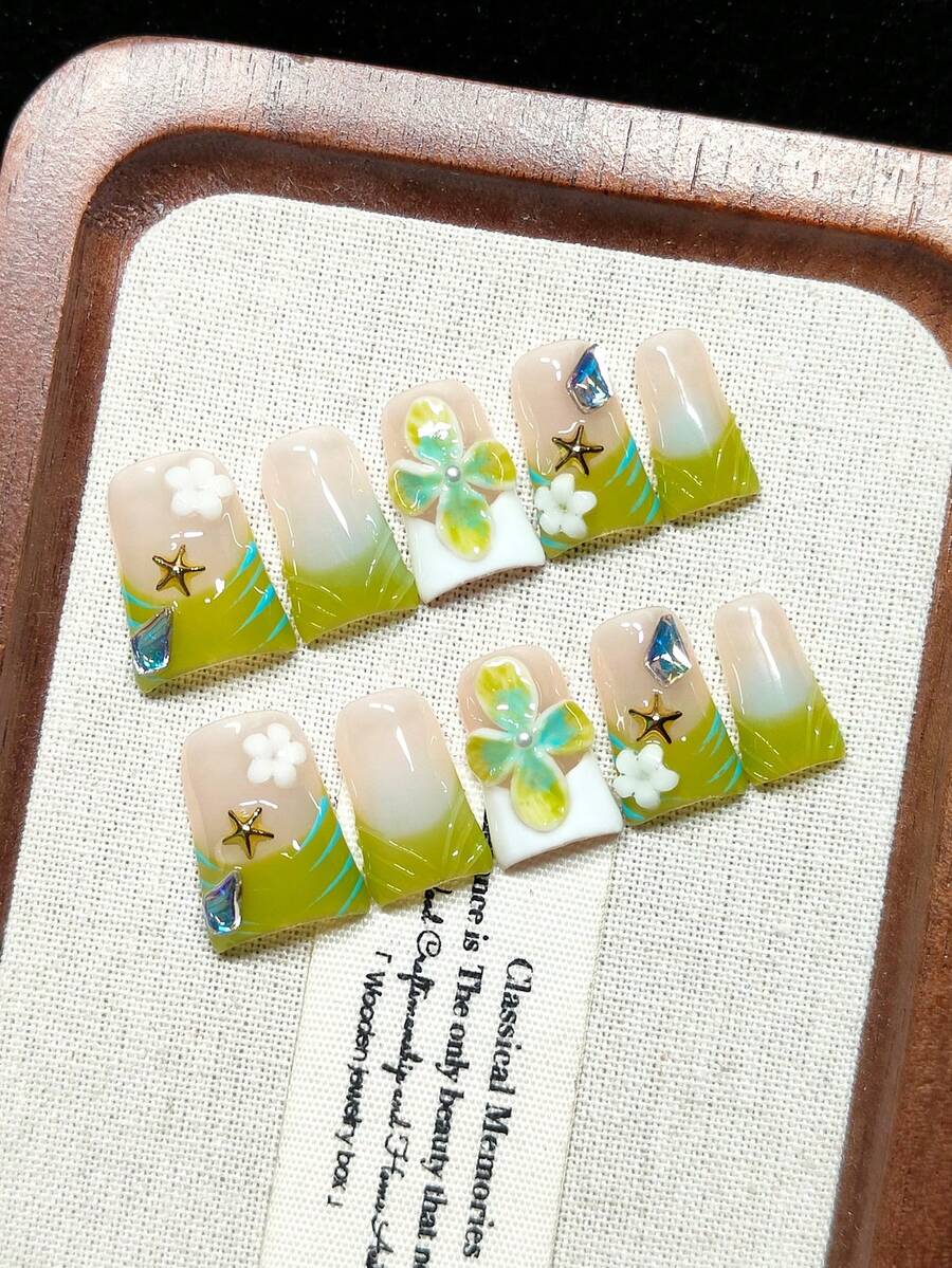 Press-On Fake Nails, Handmade Wearable Nails, Short Duck Shape, Nude With Green And White French Tips, Gradient Tie Dye Design, Hand-Painted Blue Stripes, Handmade 3D Green Floral Carving, Transparent Drag Design, White Pearls, 3D White Flowers And Gold Starfish Decoration, Rhombus Rhinestone Glitter, Fresh And Sweet Style, Exquisite And Elegant, Reusable