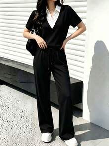 女士新款 Polo 领短袖 T 恤搭配松紧腰宽松长裤两件套，春夏款。撞色 Polo 衫搭配阔腿裤，适合户外运动、健身、通勤、街头穿搭，黑色优雅。 - 黑色 - 查看 3