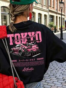 黑色短袖T恤，印有TOKYO和賽車圖案。寬鬆舒適，適合日常穿搭與度假。休閒夏季款 - 黑色 - 查看 2