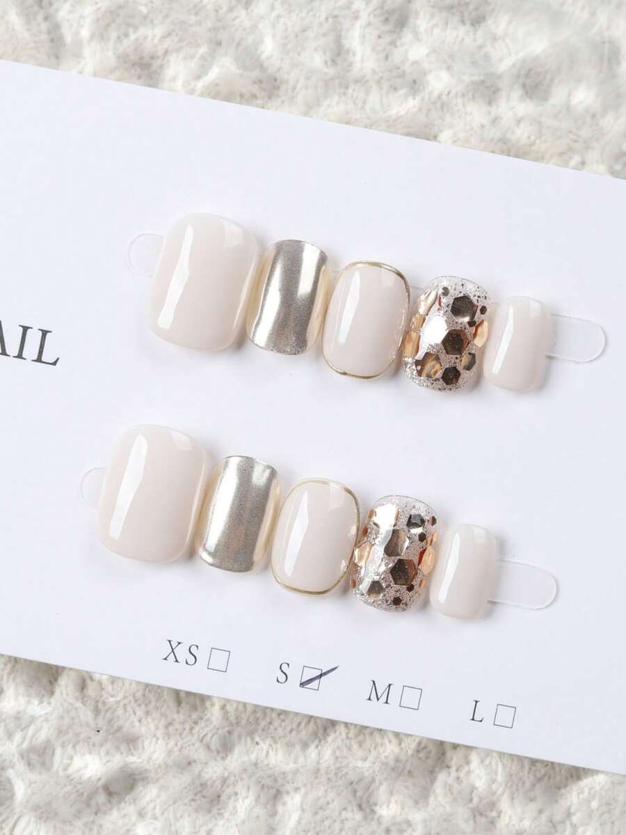 10 miếng móng tay giả dán ngắn hình oval làm thủ công, móng acrylic màu trắng sữa & vàng champagne, phong cách nhẹ nhàng sang trọng, trang trí lá vàng kim tuyến, phối màu tối giản, có thể tái sử dụng, phù hợp cho hàng ngày, tiệc tùng & lễ hội, mọi mùa, dòng nail art vàng bán chạy - Vàng - Xem 1