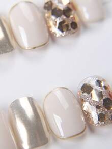 10 miếng móng tay giả dán ngắn hình oval làm thủ công, móng acrylic màu trắng sữa & vàng champagne, phong cách nhẹ nhàng sang trọng, trang trí lá vàng kim tuyến, phối màu tối giản, có thể tái sử dụng, phù hợp cho hàng ngày, tiệc tùng & lễ hội, mọi mùa, dòng nail art vàng bán chạy - Vàng - Xem 3