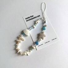 Cordón para teléfono estilo isla con conchas naturales & estrella de mar, fragmentos de conchas naturales seleccionados, estrella de mar de piedra porosa combinada con cuentas de esmalte azul & perlas falsas, textura de playa natural. Enhebrado a mano estilo vintage casual, adecuado para teléfonos, llaves & bolsos de hombro, ambiente de vacaciones, accesorio fresco de nicho de verano, creando un estilo relajado de playa - Celeste - Ver 5