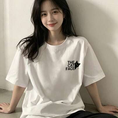 レディース カジュアル ホワイト ラウンドネックTシャツ、ドロップショルダー、ショートスリーブ、「猫の顔」プリント、デイリー使いに最適なソフトニットトップス