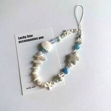 Cordón para teléfono estilo isla con conchas naturales & estrella de mar, fragmentos de conchas naturales seleccionados, estrella de mar de piedra porosa combinada con cuentas de esmalte azul & perlas falsas, textura de playa natural. Enhebrado a mano estilo vintage casual, adecuado para teléfonos, llaves & bolsos de hombro, ambiente de vacaciones, accesorio fresco de nicho de verano, creando un estilo relajado de playa - Celeste - Ver 1