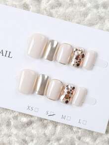 10 miếng móng tay giả dán ngắn hình oval làm thủ công, móng acrylic màu trắng sữa & vàng champagne, phong cách nhẹ nhàng sang trọng, trang trí lá vàng kim tuyến, phối màu tối giản, có thể tái sử dụng, phù hợp cho hàng ngày, tiệc tùng & lễ hội, mọi mùa, dòng nail art vàng bán chạy - Vàng - Xem 4