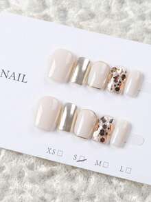 10 miếng móng tay giả dán ngắn hình oval làm thủ công, móng acrylic màu trắng sữa & vàng champagne, phong cách nhẹ nhàng sang trọng, trang trí lá vàng kim tuyến, phối màu tối giản, có thể tái sử dụng, phù hợp cho hàng ngày, tiệc tùng & lễ hội, mọi mùa, dòng nail art vàng bán chạy - Vàng - Xem 15