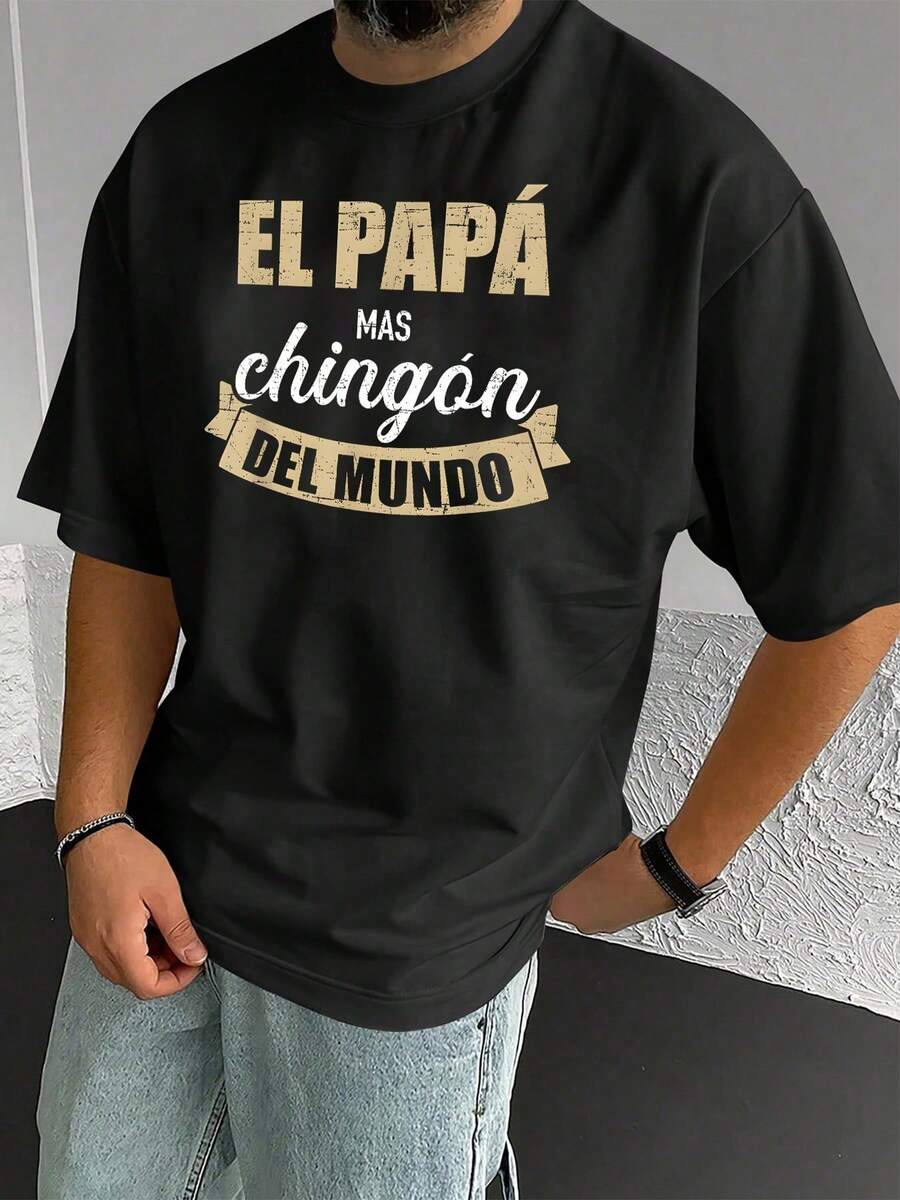 "Of The World." Casual Short-Sleeved Cotton T-Shirt For Father's Day, Everyday Wear, And Urban Style. Comfortable Fit, Lightweight Fabric, Modern Design. Perfect Gift For Dad Or Yourself. JPOY - Black - View 1