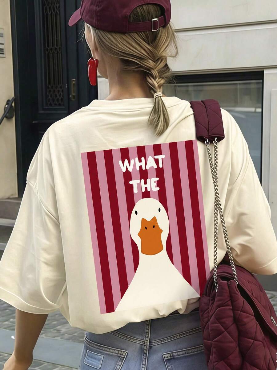 Women's Pink "What The" Funny Duck Print Short Sleeve T-Shirt | Red And White Striped Background | Playful Cartoon Style - Apricot - View 1