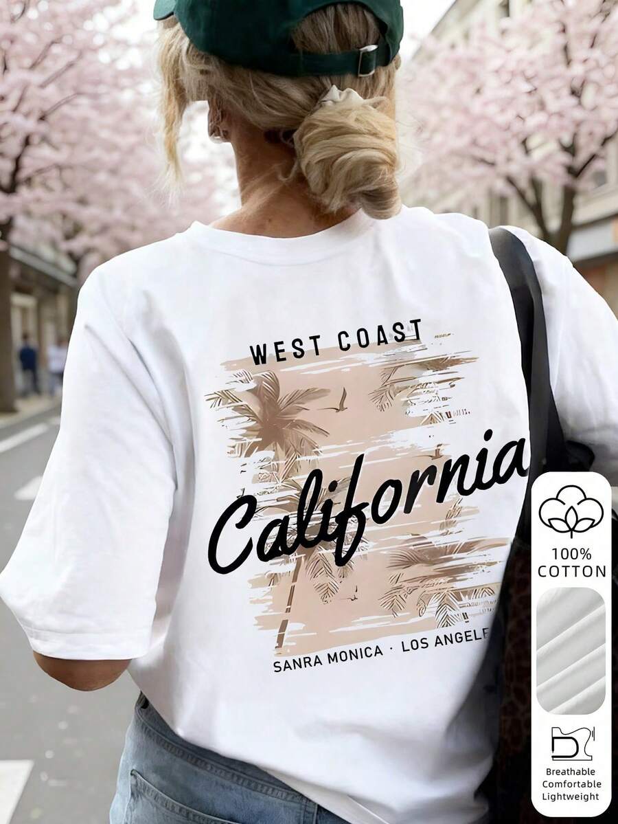 T-shirt vintage bianca a maniche corte da donna, girocollo, con stampa di palme da cocco colorate. Un capo versatile, adatto a ogni occasione. - Bianco - Visualizzare 1