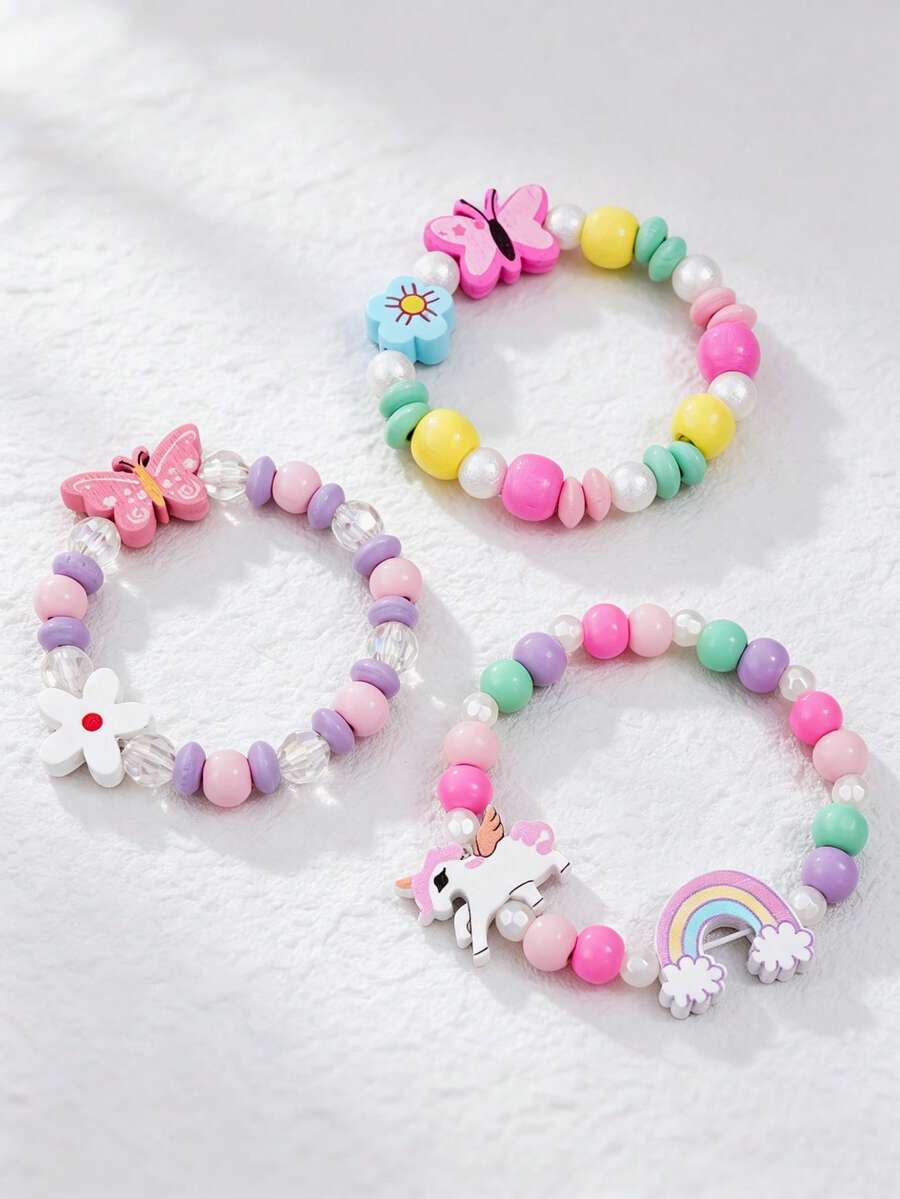 Set di 3 braccialetti in perline di legno con unicorno e farfalla per bambini, braccialetti elastici con ciondoli floreali arcobaleno, gioielli carini a tema cartoni animati, regali di amicizia per ragazze - Multicolore - Visualizzare 1